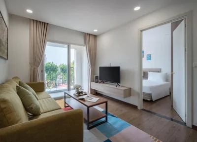 Chambre lits jumeaux avec balcon — Luxe Paradise Premium Nguyen Khac Hieu Hotel & Spa